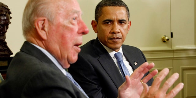 May 19, 2009: U.S. President Barack Obama listens to remarks from former U.S. Secretary of State George Schultz in the Oval Office of the White House in Washington. (Reuters)