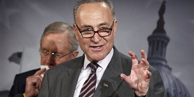 FILE: March 8, 2012: Sen. Charles Schumer gestures during a news conference on Capitol Hill in Washington.