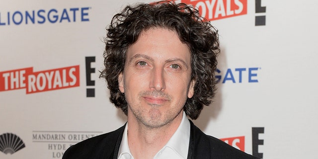 Seen in the above file photo, creator and showrunner for "The Royals," was fired Thursday amid sexual assault allegations against him.