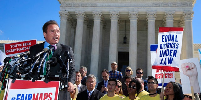 Former California Gov. Arnold Schwarzenegger speaks at a rally outside the U.S. Supreme Court in Washington, Tuesday, Oct. 3, 2017. The Supreme Court heard arguments in a case about political maps in Wisconsin that could affect elections across the country. (AP Photo/Manuel Balce Ceneta)