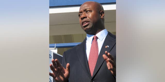 In an Oct. 19, 2010 photo, Tim Scott, Republican candidate for the U.S. House in South Carolina's 1st District, speaks to a crownd during a campaign event in North Charleston, S.C. (AP Photo/Bruce Smith)