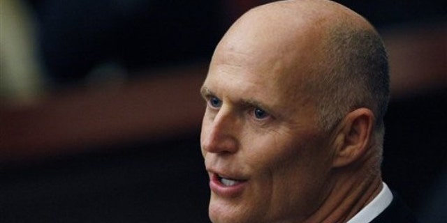 Florida Gov. Rick Scott delivers his state of the state speech to the Florida legislature in Tallahassee March 8.