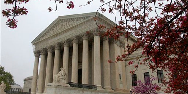 FILE: The United States Supreme Court is seen in Washington, ahead of the landmark hearings on the federal health care overhaul.