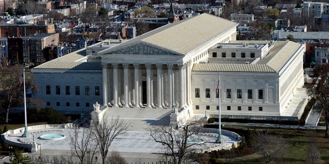 Dec. 19, 2013: A view of the Supreme Court from near the top of the Capitol Dome on Capitol Hill.