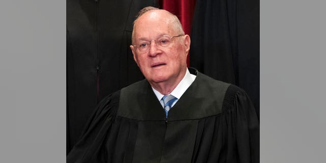 In this June 1, 2017, file photo, Supreme Court Associate Justice Anthony M. Kennedy joins other justices of the U.S. Supreme Court for an official group portrait at the Supreme Court Building in Washington. The 81-year-old Kennedy said June 27, 2018, that he is retiring after more than 30 years on the court.