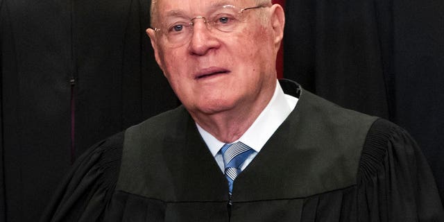 In this June 1, 2017, file photo, Supreme Court Associate Justice Anthony M. Kennedy joins other justices of the U.S. Supreme Court for an official group portrait at the Supreme Court Building in Washington. The 81-year-old Kennedy said June 27, 2018, that he is retiring after more than 30 years on the court.