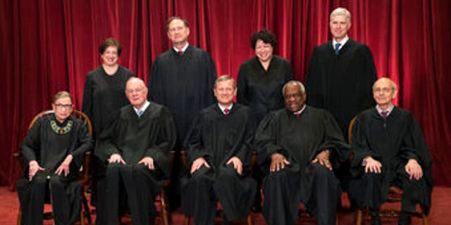 The justices of the U.S. Supreme Court gather on June 1, 2017, for an official group portrait: Seated, from left: Associate Justice Ruth Bader Ginsburg; Associate Justice Anthony M. Kennedy; Chief Justice John Roberts; Associate Justice Clarence Thomas and Associate Justice Stephen Breyer. Standing, from left: Associate Justice Elena Kagan; Associate Justice Samuel Alito Jr.; Associate Justice Sonia Sotomayor and Associate Justice Neil Gorsuch.