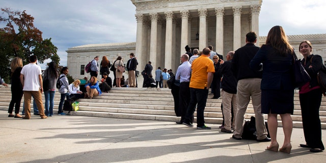 Oct. 13, 2015: People line up outside of the Supreme Court in Washington as the justices began to discuss sentences for young prison 'lifers.'