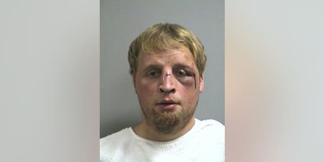 Booking photo of Jayson Newlun, 26, charged with child molestation in the first degree and statutory sodomy.