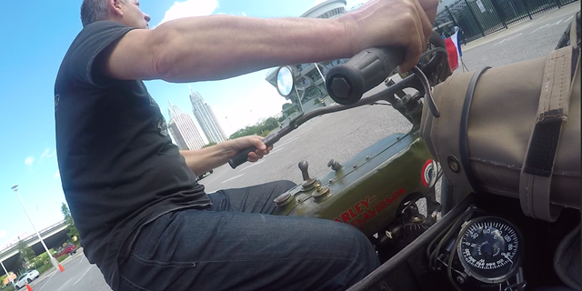 A GoPro captures Pierre Lauvergeat turning the motorcycle in a test ride before leaving Mobile, Ala. for Jacksonville, Fla.