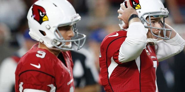 Arizona Cardinals kicker Chandler Catanzaro (7) reacts to missing a game-winning field goal as punter Ryan Quigley (9) looks on attempt during overtime of an NFL football game against the Seattle Seahawks, Sunday, Oct. 23, 2016, in Glendale, Ariz. The game ended in overtime in a 6-6 tie. (AP Photo/Ross D. Franklin)