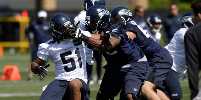 5b41fa68-Seahawks Rookies Football