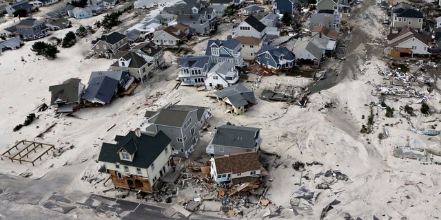 In this Oct. 31, 2012 file photo, a view from the air shows the destroyed homes left in the wake of Superstorm Sandy in Ortley Beach, N.J. (AP Photo/Mike Groll, File)