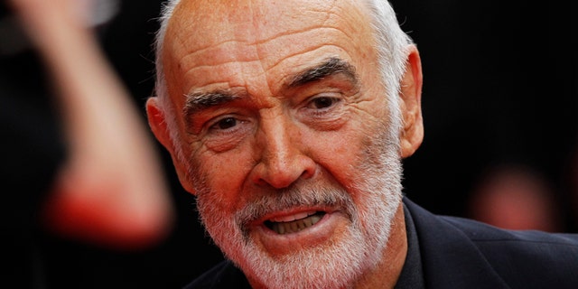 Actor Sean Connery arrives for the Edinburgh International Film Festival opening night showing of the animated movie 'The Illusionist' at the Festival Theatre in Edinburgh, Scotland June 16, 2010. REUTERS/David Moir (BRITAIN - Tags: ENTERTAINMENT HEADSHOT) - RTR2F9EH