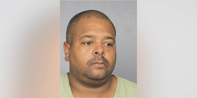 Sean Simpson, a teacher at Marjory Stoneman Douglas High School, was arrested and charged after he left a loaded pistol in a public bathroom.