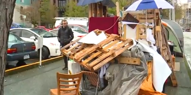 The homeless "mansion" was put together with whatever items people could scrounge together.