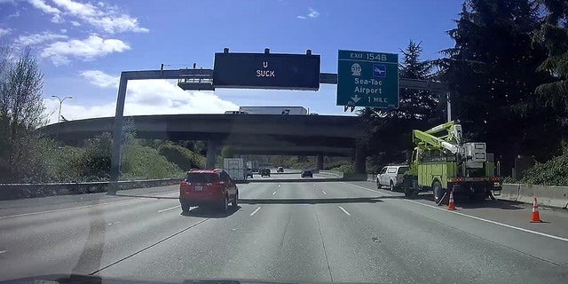 A sign reading 'U SUCK' was spotted along Interstate Highway 4 in Washington State.