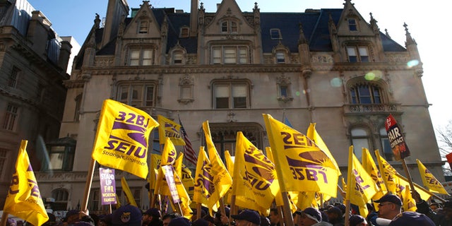 Members of the Service Employees International Union (SEIU) at a protest in support of a new contract for apartment building workers in New York City in 2014.