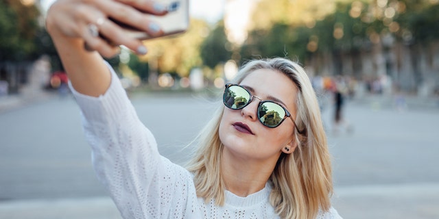 selfie woman millennial istock medium