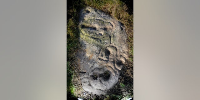 A stone Age carving on Baildon Moor which Gordon Holmes believes is a selfie of the artist under the symbol for Cassiopeia.