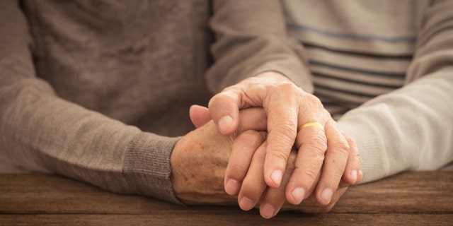 Old people holding hands. couple concept. love concept.
