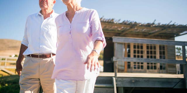 seniors-walking-from-house