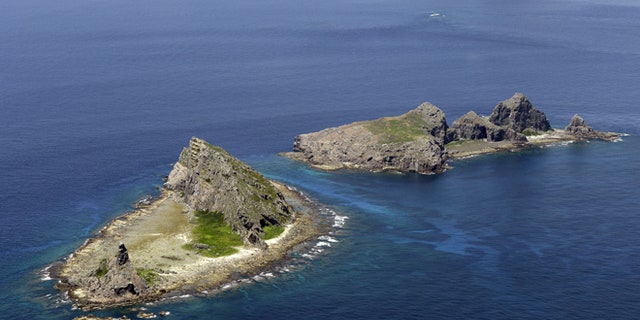 In this Sept. 2012 photo, the tiny islands in the East China Sea, called Senkaku in Japanese and Diaoyu in Chinese, are seen.
