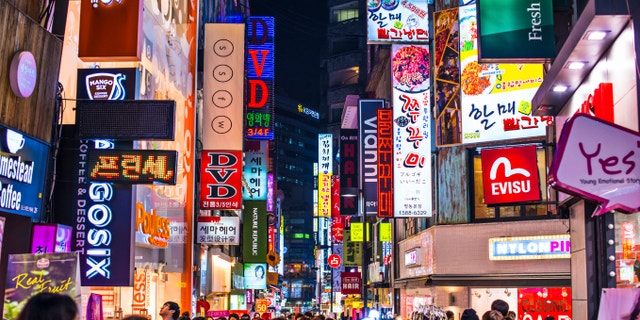 SEOUL - FEBRUARY 14: Myeong-Dong Neon Lights February 14, 2013 in Seoul, South Korea. The location is the premiere district for shopping in the city.