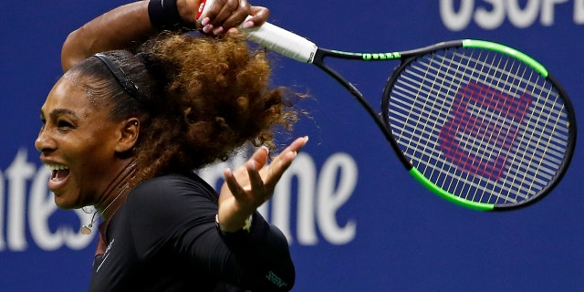 Serena Williams watches a return to Venus Williams during the third round of the U.S. Open tennis tournament, in Flushing, N.Y., Aug. 31, 2018.