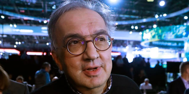 FILE - In this Tuesday, Jan. 16, 2018 filer, Fiat Chrysler Automobiles CEO Sergio Marchionne is interviewed after the unveiling of the new 2019 Jeep Cherokee during the North American International Auto Show, in Detroit. On Wednesday, July 25, 2018, holding company of Fiat founding family said Sergio Marchionne, who oversaw turnarounds of Fiat and Chrysler, has died. (AP Photo/Carlos Osorio, File )