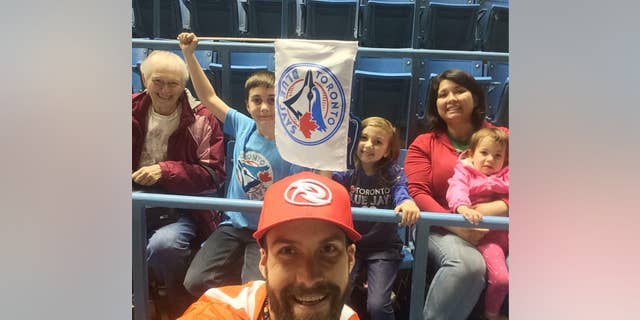 Dorothy Sewell (far left) had "almost as much love" for Toronto sports "as she did for her family," her grandson said.