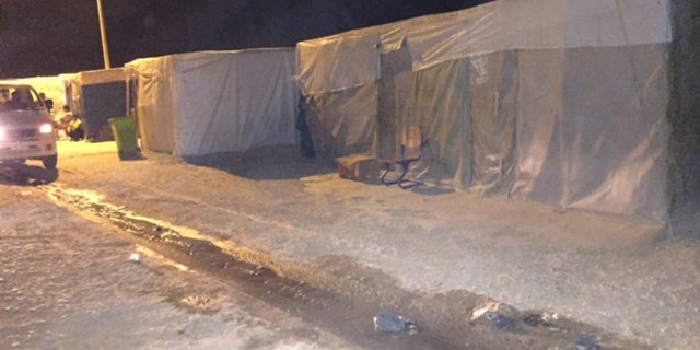 In this tent city for refugees in Dohuk, Iraq, a mother and child were reunited last week.