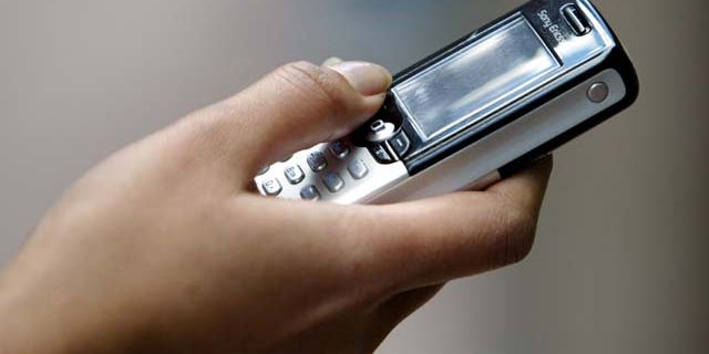 A woman uses her mobile telephone to send a text message in a central
Sydney shopping mall September 15, 2003. Stolen phones will now be
blocked on all Australian mobile networks rendering them virtually
worthless because they can no longer be used. The initiative is a world
first and part of a national response plan on the management of stolen
mobile telephones. Around 100,000 mobiles phones are lost or stolen in
Australia each year. REUTERS/Will Burgess
WB/RCS