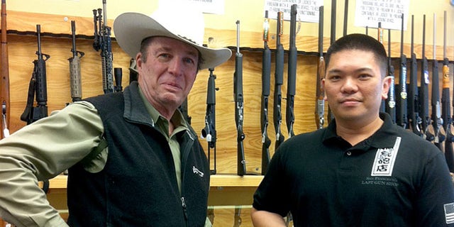 Retired Texas Sheriff Jim Wilson, (l.), visited the gunshop when he went to San Francisco.