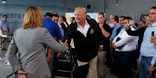 President Trump and San Juan Mayor Carmen Yulin Cruz shook hands during the president's visit on Tuesday, Oct. 3, 2017.