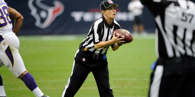 Line Judge Shannon Eastin (27) works the field during the first half of an NFL preseason football game between the Houston Texans and the Minnesota Vikings, Thursday, Aug. 30, 2012, in Houston. (AP Photo/Dave Einsel)
