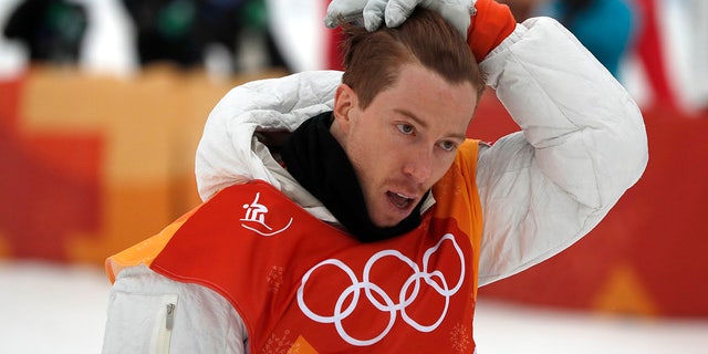 Shaun White was lit up on social media after appearing to drag the American flag on the ground.