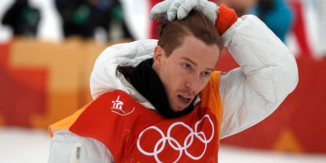 Shaun White was lit up on social media after appearing to drag the American flag on the ground.