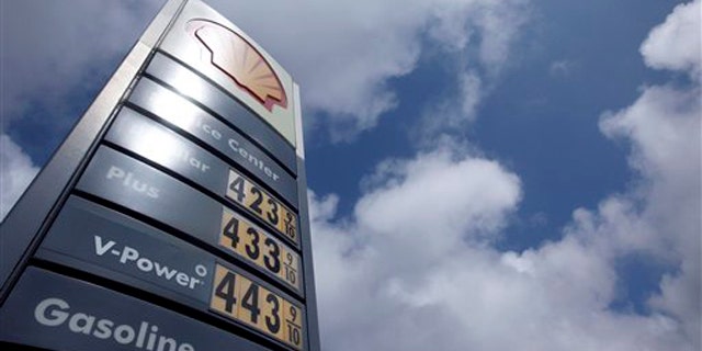 The price board at a Shell gas station is shown in San Francisco April 11.