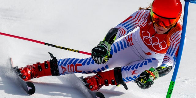Mikaela Shiffrin, of the United States, attacks the gate during the second run of the Women's Giant Slalom at the 2018 Winter Olympics in Pyeongchang, South Korea, Thursday, Feb. 15, 2018.