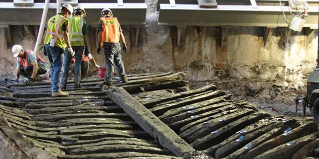 The timbers of the ship uncovered at the World Trade Center site, exposed to the air for possibly the first time in more than 200 years.