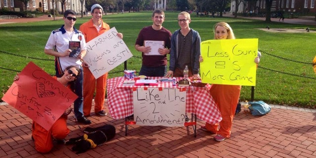 Members of the University of Delaware Students for the Second Amendment Club state their case on campus