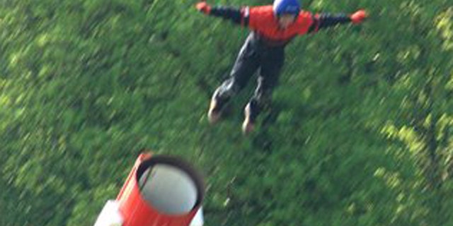 April 25: A human cannonball is propelled from the barrel moments before he died after a safety net failed during the stunt at the Kent County Showground in Detling, south eastern England