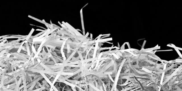 In DARPA's Shredder Challenge, 9,000 teams competed to reassemble and reconstruct shredded documents and solve assocated puzzles.