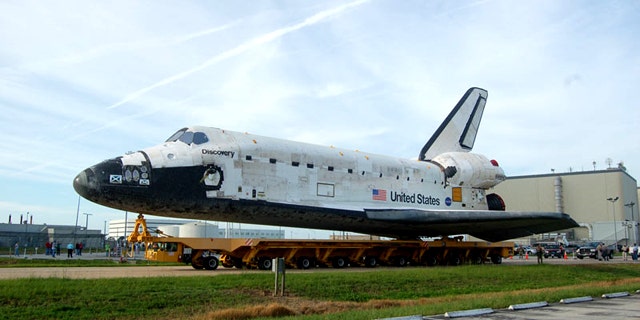 Space shuttle Discovery moved from its processing hangar to the Vehicle Assembly Building on Sept. 9, 2010, to be connected to its external tank and two solid rocket boosters for launch. Liftoff is targeted for Nov. 1 on the STS-133 mission.