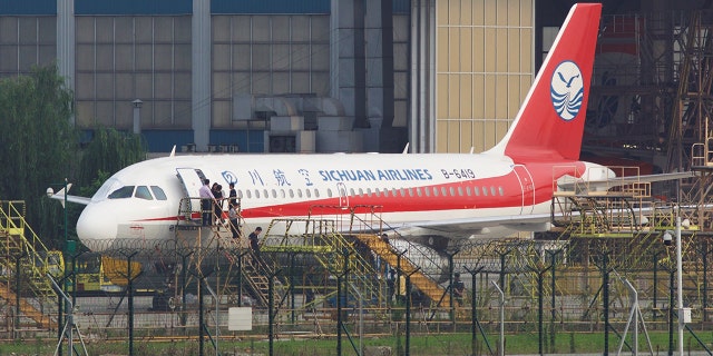 The co-pilot was wearing a seatbelt and was pulled back in, suffering only minor injuries.