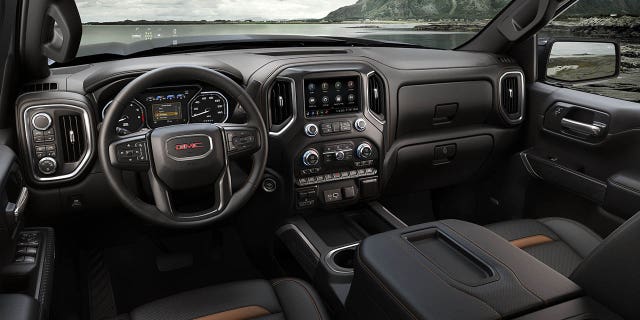 The AT4 interior echos the exterior's dark-tinted look.