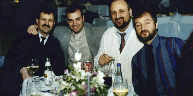 Stephen, second from left, was planning to play a round of golf with his brothers Frank, George and Russ (left to right) on September 11 before he heard on his scanner about the scene at the World Trade Center.