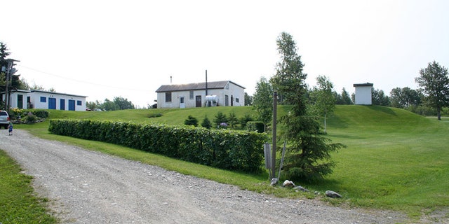 Instead of turning one of the buildings on the property into living quarters, the couple decided to build a new two-bedroom home there between the assembly shop and the former barracks.