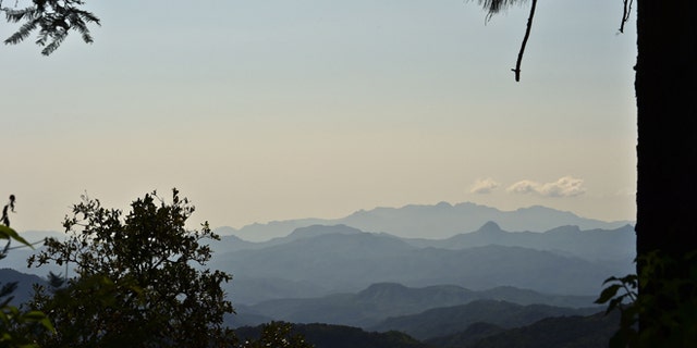 Picture taken at Mexico's Sierra Madre Occidental mountain range -- the bastion of Joaquin "El Chapo" Guzman's Sinaloa drug cartel -- near El Limon, in Durango State, on October 18, 2015. Bullet holes on roofs, charred cars and deserted villages were left in the wake of a military operation to catch fugitive drug baron Joaquin "El Chapo" Guzman in northwest Mexico. AFP PHOTO / RONALDO SCHEMIDT (Photo credit should read RONALDO SCHEMIDT/AFP/Getty Images)